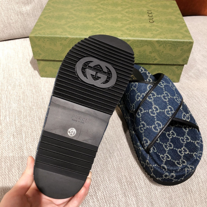 G*u*i slippers
